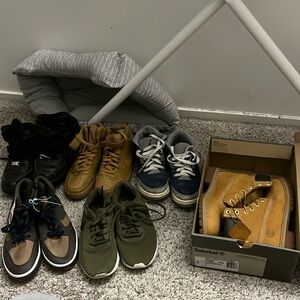 Boy youth and men shoes (boots and sneakers). Sizes range from 4.5-9